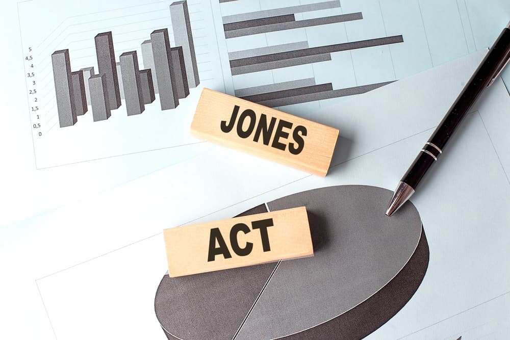 JONES ACT wooden block on a chart background